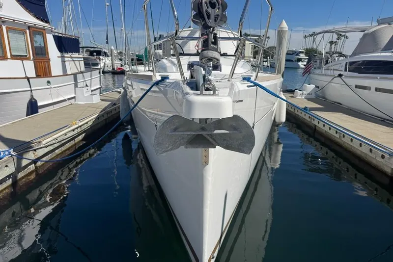 Slide: The Image of 2017 Jeanneau Sun Odyssey 449 yacht docked at marina, front view. - 3