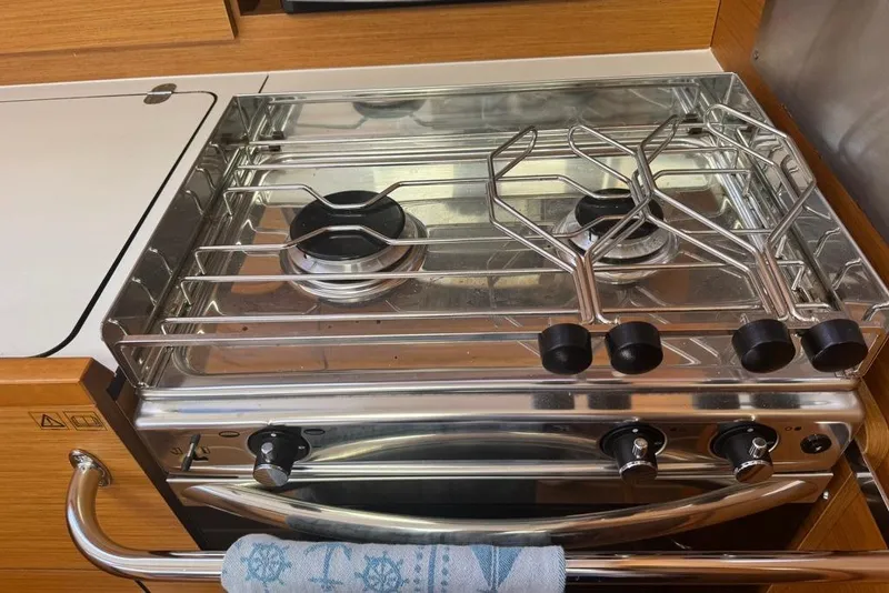 Slide: The Image of Stainless steel stove in 2017 Jeanneau Sun Odyssey 449 yacht kitchen. - 60