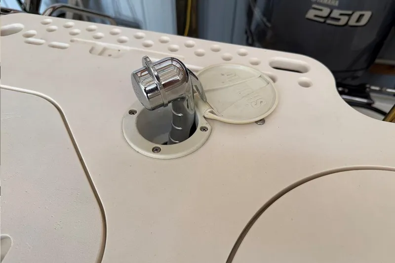 Slide: The Image of Fuel cap on a 2007 Pursuit C 310 Center Console boat deck. - 31