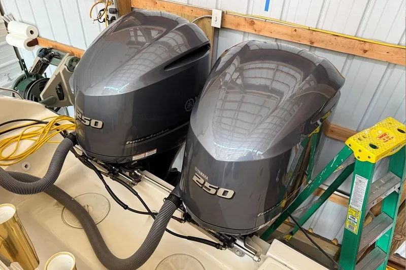 Slide: The Image of Twin Yamaha 250 outboard engines on a 2007 Pursuit C 310 Center Console boat. - 39