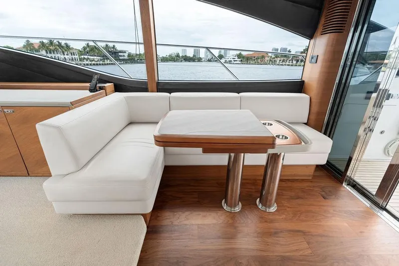 Slide: The Image of Luxurious interior of 2020 Princess S62 yacht with elegant seating and table. - 38