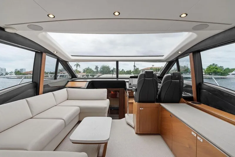 Slide: The Image of Luxurious interior of 2020 Princess S62 yacht with modern seating and panoramic windows. - 42