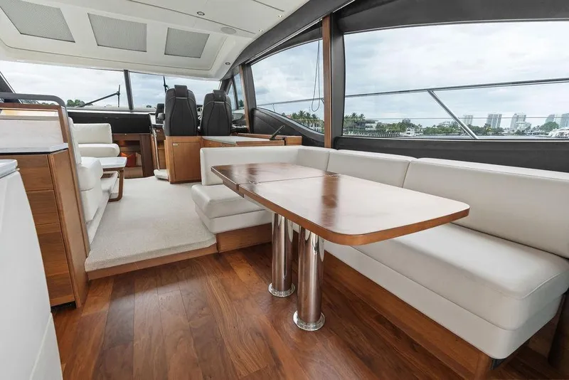Slide: The Image of Luxurious interior of 2020 Princess S62 yacht with elegant seating and wooden table. - 43