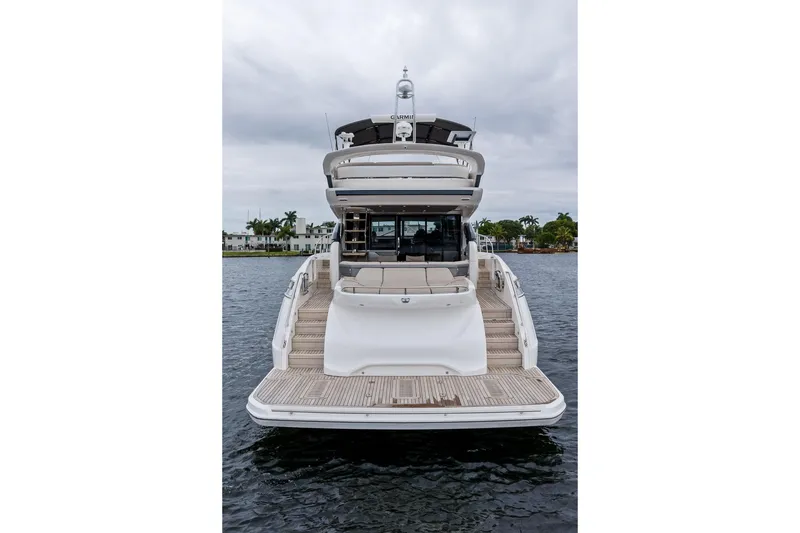 Slide: The Image of Luxury 2020 Princess S62 yacht on water, rear view with spacious deck. - 5
