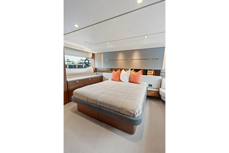 Slide: The Image of Luxurious bedroom interior of 2020 Princess S62 yacht with modern design and plush bedding. - 70