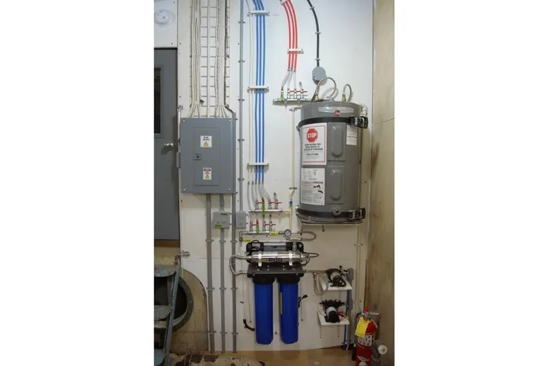 Slide: The Image of Electrical and plumbing setup in a 1977 Commercial Expedition Trawler. - 19
