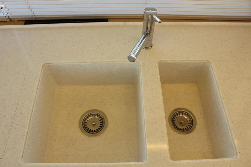 Slide: The Image of Double sink on Greenline 48 Coupe 2019 yacht. - 18