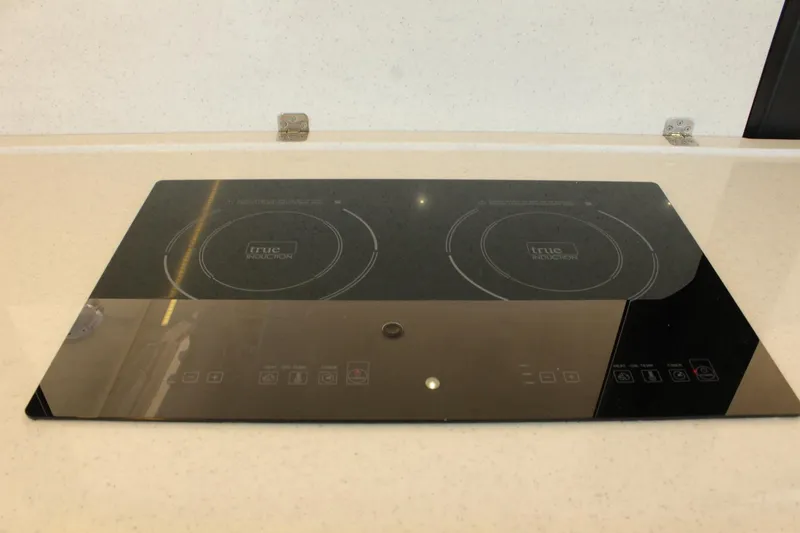 Slide: The Image of Induction cooktop on Greenline 48 Coupe 2019 yacht. - 19