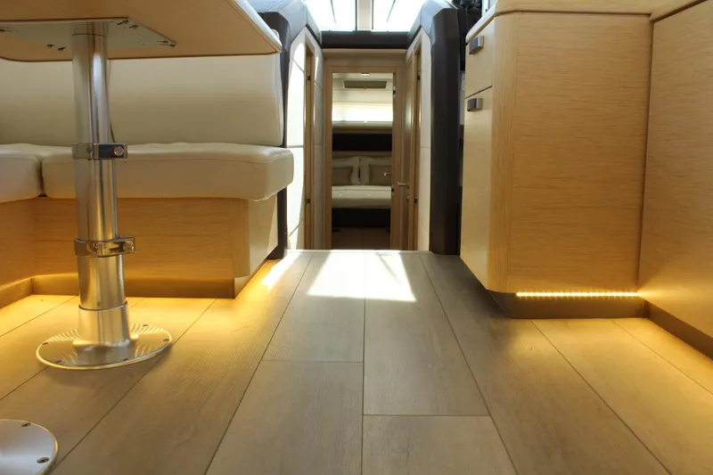 Slide: The Image of Interior of 2019 Greenline 48 Coupe with wooden flooring and LED lighting. - 23