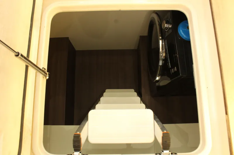Slide: The Image of Interior of 2019 Greenline 48 Coupe with washing machine. - 24