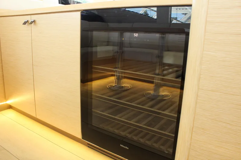 Slide: The Image of Wine cooler in Greenline 48 Coupe 2019 yacht interior. - 26