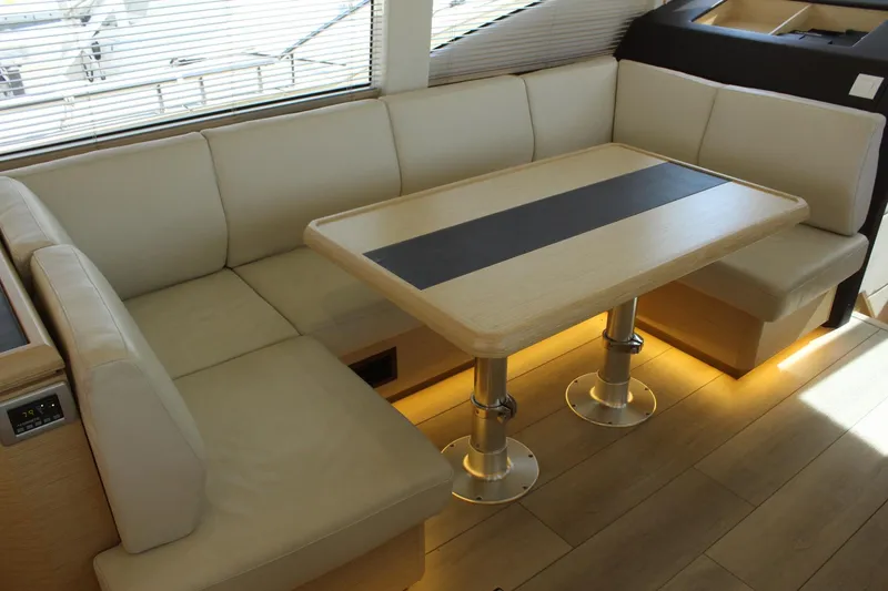 Slide: The Image of Interior of 2019 Greenline 48 Coupe with elegant seating area. - 28