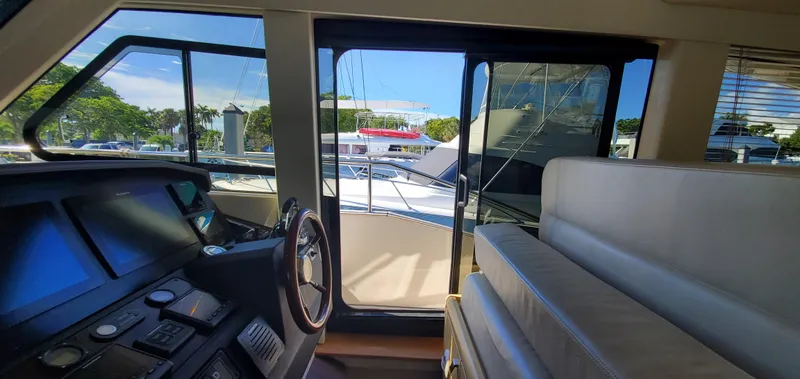 Slide: The Image of Interior of a 2019 Greenline 48 Coupe yacht with harbor view. - 32