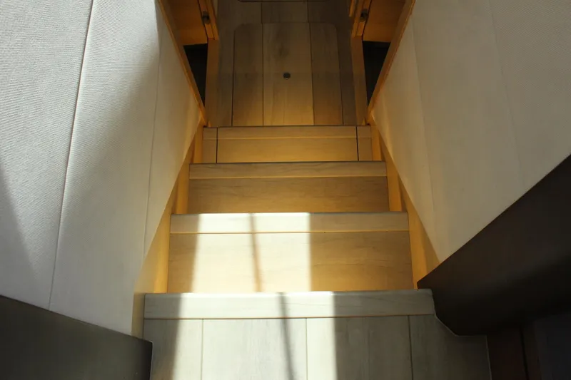 Slide: The Image of Interior of 2019 Greenline 48 Coupe with wooden stairs. - 34