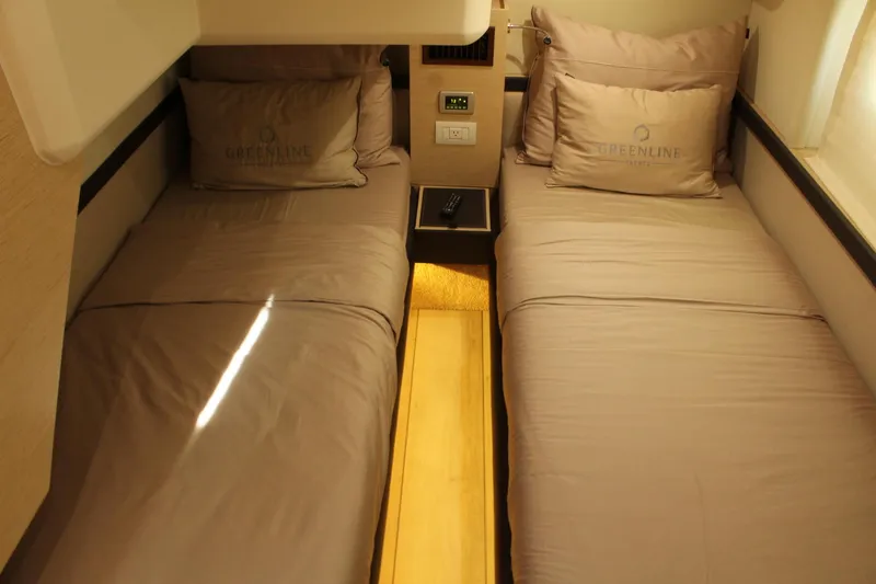 Slide: The Image of Interior of 2019 Greenline 48 Coupe with twin beds. - 36