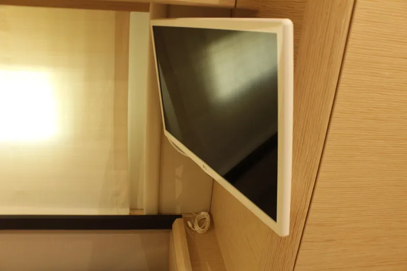 Slide: The Image of Flat screen TV inside the Greenline 48 Coupe 2019. - 37