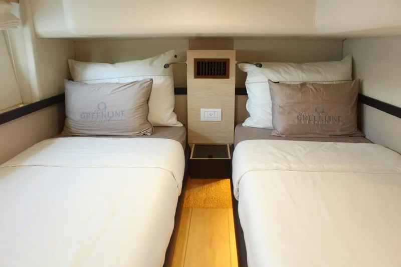 Slide: The Image of Interior of 2019 Greenline 48 Coupe with twin beds. - 40