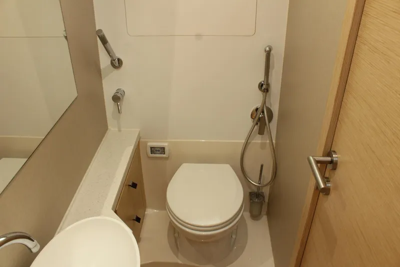 Slide: The Image of Bathroom in 2019 Greenline 48 Coupe with toilet and sink. - 41