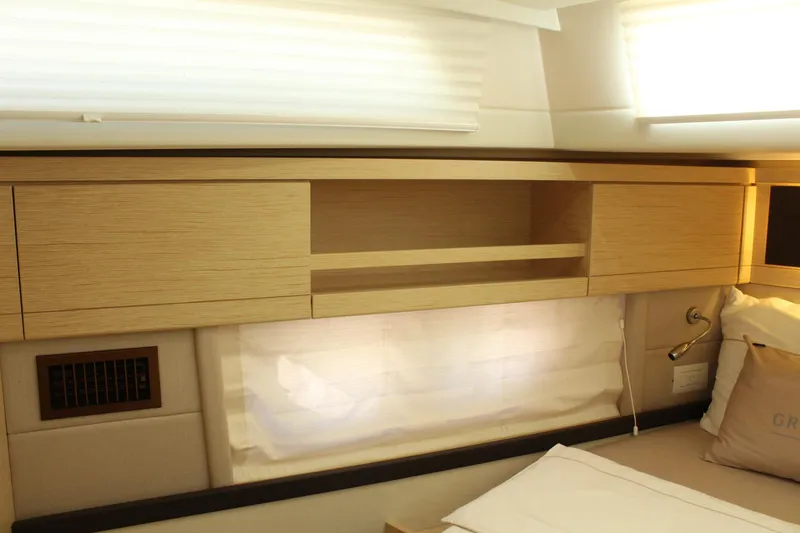 Slide: The Image of Interior of 2019 Greenline 48 Coupe with wooden cabinets. - 45