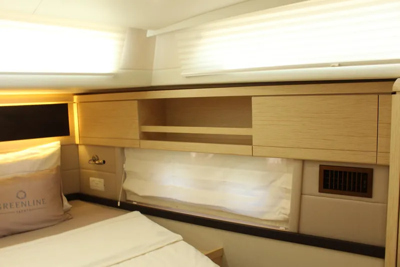 Slide: The Image of Interior of 2019 Greenline 48 Coupe with wooden cabinets. - 46