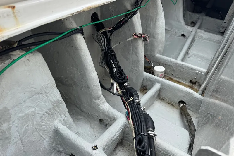 Slide: The Image of Interior wiring and structure of a 1994 Luhrs 32 Convertible boat. - 70