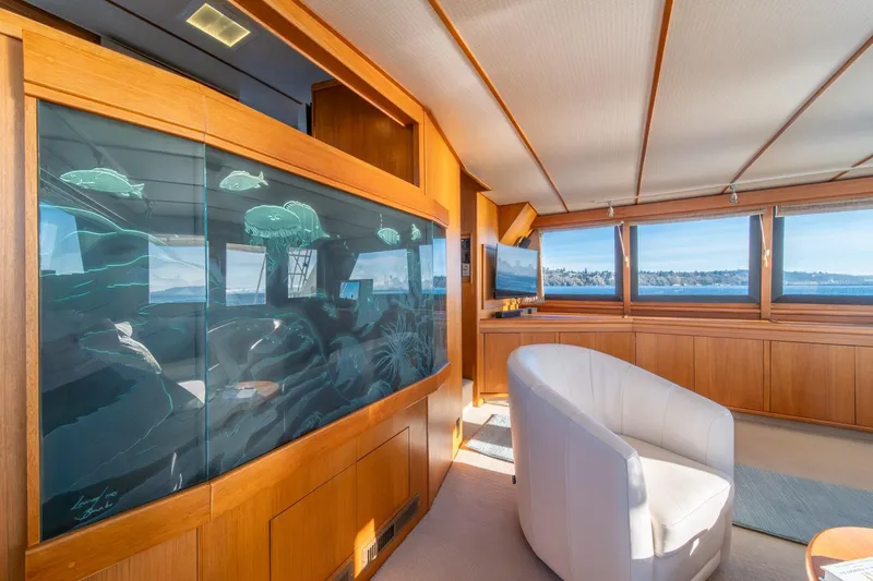 Slide: The Image of Luxurious interior of 1991 Tollycraft 57 Pilothouse Motor Yacht with scenic views. - 14