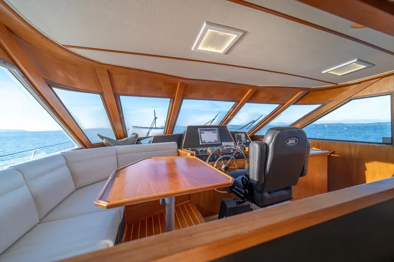Slide: The Image of Luxurious 1991 Tollycraft 57 Pilothouse Motor Yacht interior with panoramic ocean views. - 20