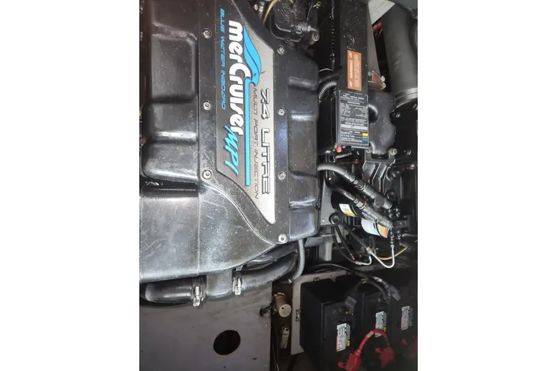 Slide: The Image of Engine compartment of a 1996 Sea Ray 370 Sedan Bridge with MerCruiser 7.4L engine. - 24