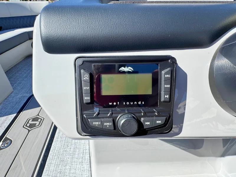 Slide: The Image of The image shows a Wet Sounds audio system on a Harris Cruiser 230 boat. - 21