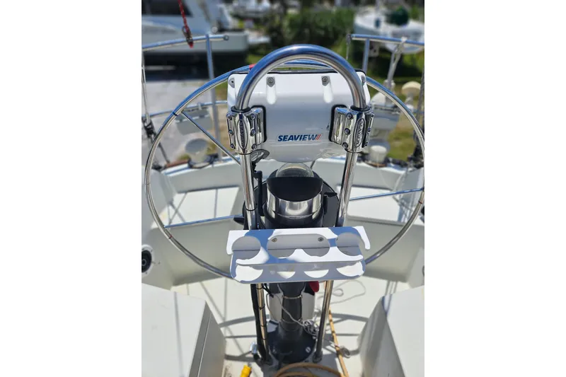 Slide: The Image of Steering wheel of a 1986 C & C 29 SL sailboat with Seaview equipment. - 10