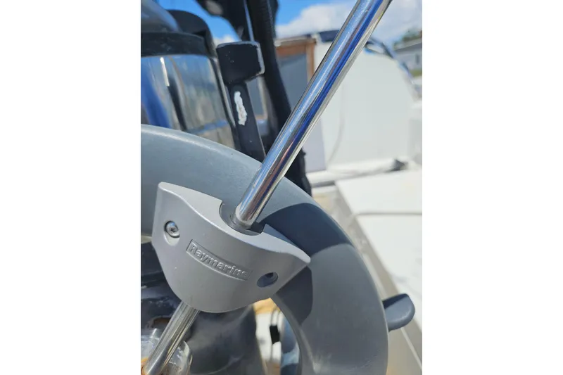 Slide: The Image of Close-up of a Raymarine steering wheel on a 1986 C & C 29 SL sailboat. - 11