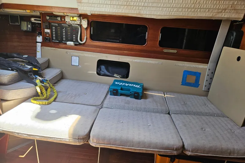 Slide: The Image of Interior of 1986 C & C 29 SL sailboat with cushions and control panel. - 21