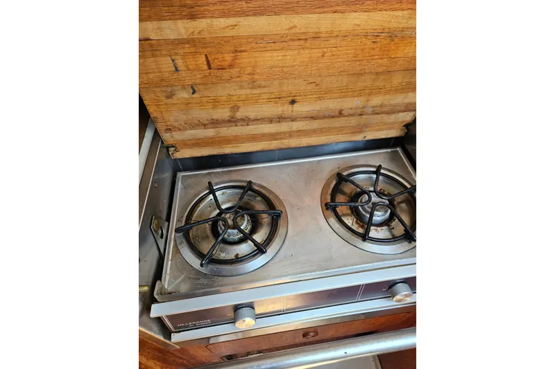 Slide: The Image of Two-burner stove in a 1986 C & C 29 SL sailboat galley. - 28