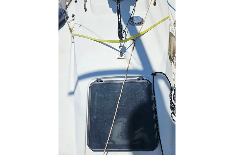 Slide: The Image of Deck view of 1986 C & C 29 SL sailboat with hatch and rigging. - 37