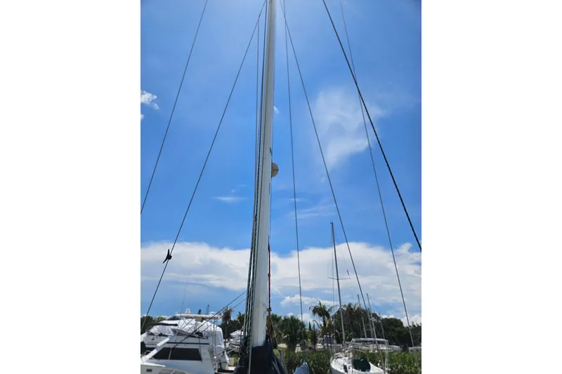 Slide: The Image of Sailboat mast of 1986 C & C 29 SL under clear blue sky. - 39