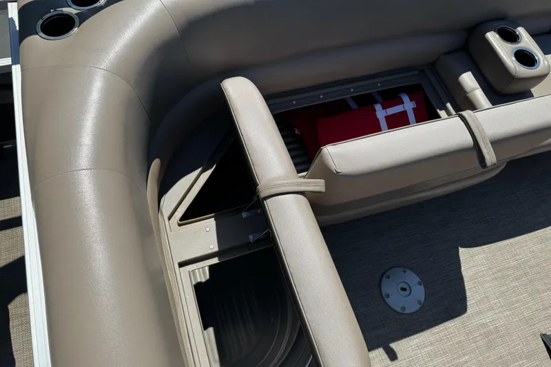 Slide: The Image of Interior of a 2020 Ranger 200F boat showing seating and storage compartment. - 22