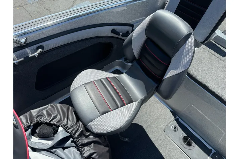 Slide: The Image of 2018 Ranger 1880MS boat interior with sleek black and gray seating. - 21