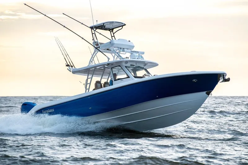The Image of 2025 Everglades 395 Center Console boat cruising on open water. - 0