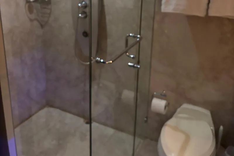 Slide: The Image of Bathroom interior of 2008 Lazzara LSX 75 yacht with glass shower and toilet. - 13