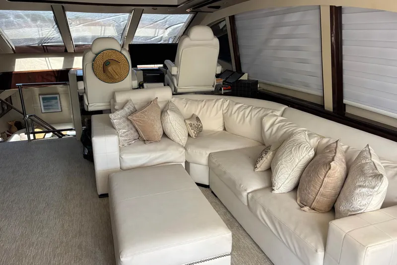 Slide: The Image of Luxurious interior of 2008 Lazzara LSX 75 yacht with plush white seating and elegant decor. - 30