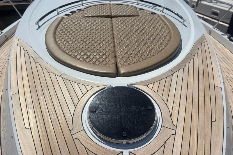Slide: The Image of Luxury 2008 Lazzara LSX 75 yacht with elegant teak deck and cushioned seating. - 31