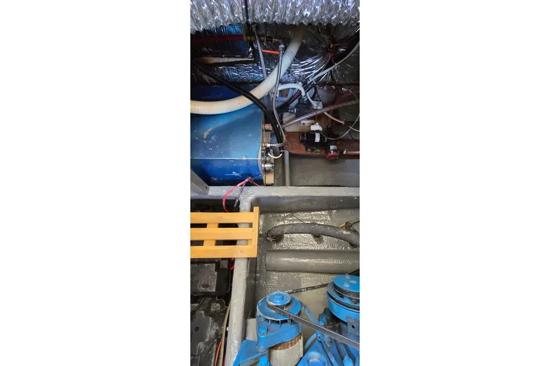 Slide: The Image of Engine room of 1985 Carver 3207 Aft Cabin Yacht. - 31