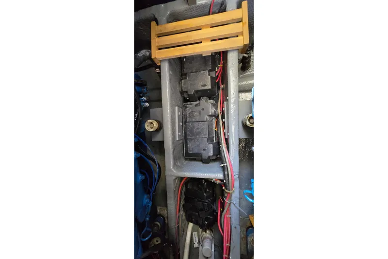 Slide: The Image of Engine compartment of 1985 Carver 3207 Aft Cabin Motor Yacht with wiring and components. - 33