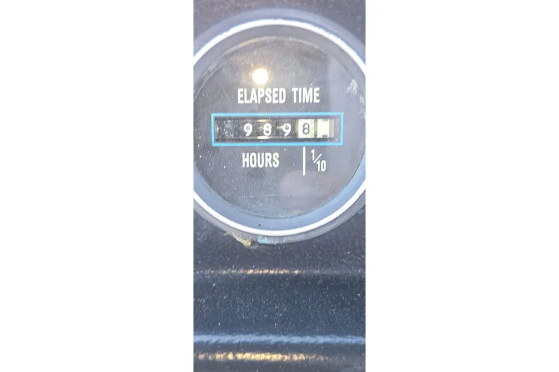 Slide: The Image of Elapsed time gauge showing 998.1 hours on 1985 Carver 3207 Aft Cabin Motor Yacht. - 8