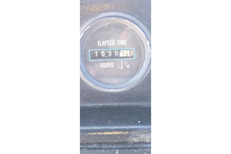 Slide: The Image of Hour meter showing 1030.5 hours on 1985 Carver 3207 Aft Cabin Motor Yacht. - 9