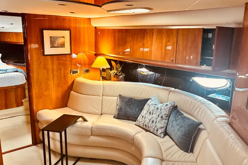 Slide: The Image of Luxurious interior of 2003 Sunseeker Predator 61 yacht with elegant seating and decor. - 15