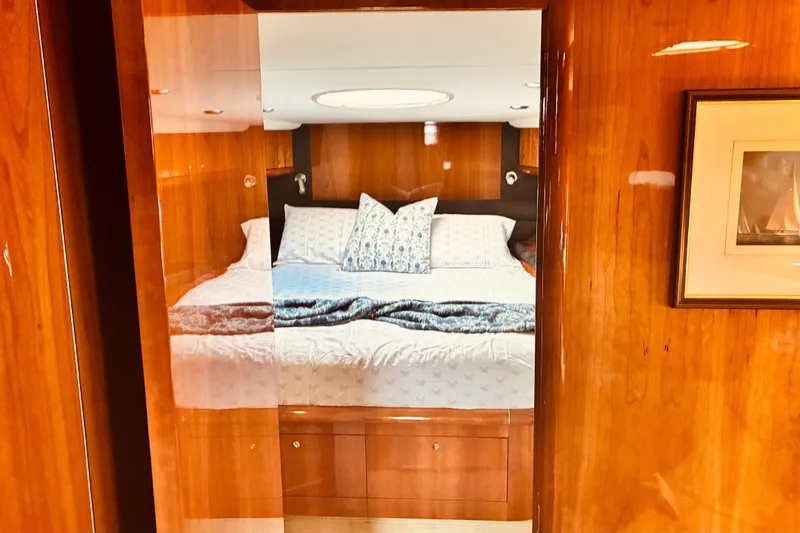 Slide: The Image of Luxurious cabin interior of 2003 Sunseeker Predator 61 yacht with cozy bedding. - 17