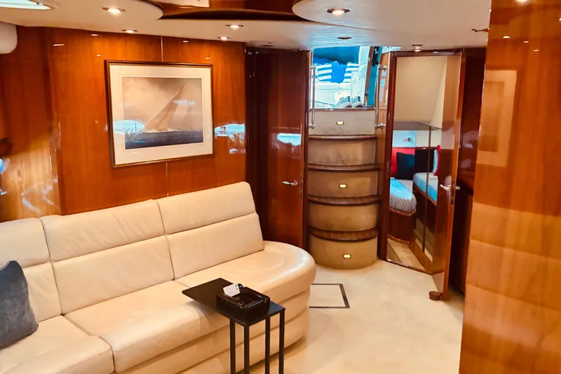 Slide: The Image of Luxurious interior of 2003 Sunseeker Predator 61 yacht with elegant wood finishes. - 25