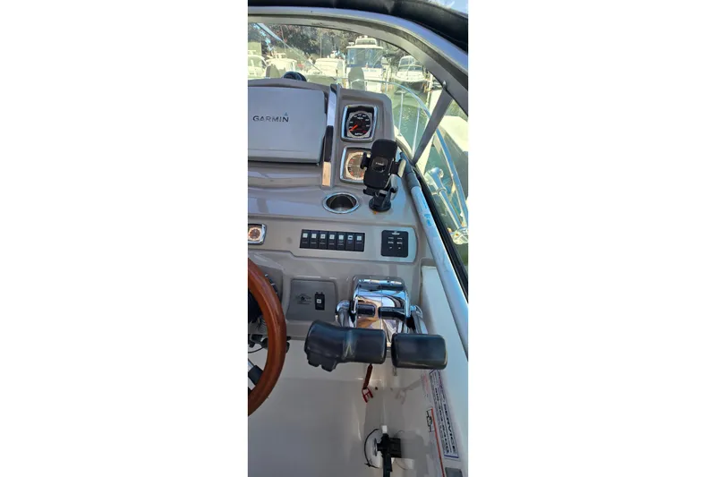 Slide: The Image of Helm of 2009 Chaparral Signature 310 boat with Garmin navigation system. - 13