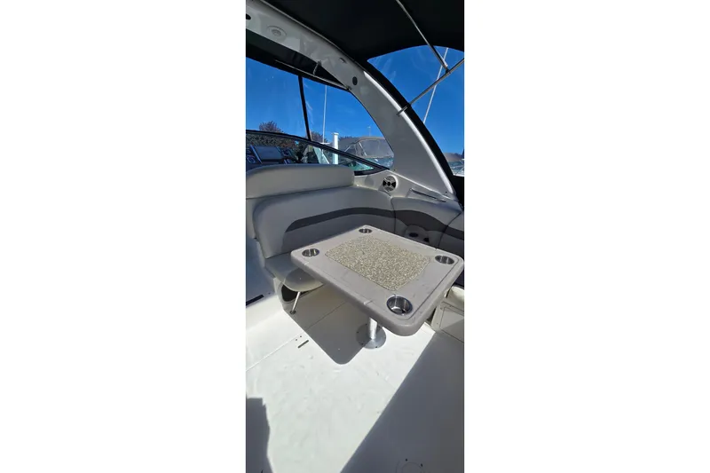 Slide: The Image of Interior of 2009 Chaparral Signature 310 boat with seating and table. - 8
